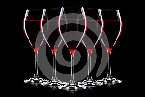 Set of glasses for red wine on black background