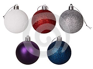 Set of glitter matt red, white, blue, silver and purple christmas balls.