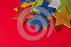 Set of glittering stars on red background