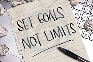 Set Goals Not Limits, text words typography written on paper, life and business motivational inspirational