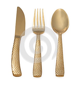 Set of gold fork. spoon and knife isolated on a white background