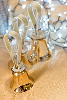 Set of gold handbells on table during concert