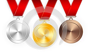 Set of gold, silver and bronze award medals with red ribbons. Medal round empty polished vector collection isolated on white