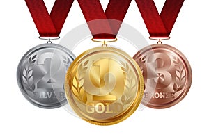 A set of gold, silver and bronze medals, the first, second and third place. Winner, champion, number one, two, three. Red ribbon.