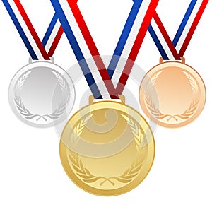 Set of gold, silver and bronze medals with ribbons