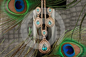 Set of golden set with gems over black background