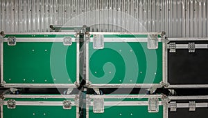 Set of green and black aluminium wooden flight cases.