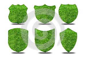 Set green grass shields on white background