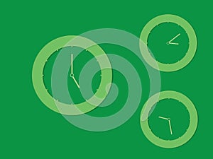 A set of green round clocks with different times on dark background