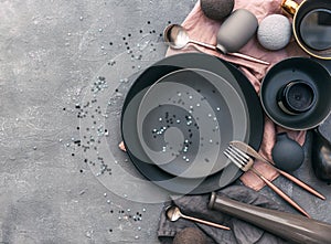 Set of grey crockery on table. Nordic style. Various plates, dish,