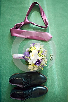Set of groom clothes. Wedding rings, shoes, cufflinks and bow tie detalis fashion