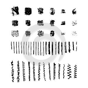 Set of grunge charcoal pencil strokes and splatters, grungy hand-drawn lines. Vector brushstroke set