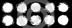 Set of grunge circles. Vector grunge round shapes. Black and white alpha channel shapes, stains and dirty splashes and spots.