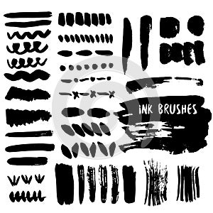 Set of grunge ink brush strokes. Vector design