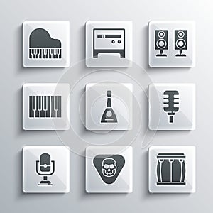 Set Guitar pick, Drum, Microphone, Balalaika, Grand piano, and Stereo speaker icon. Vector