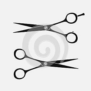 Set of hairdressing scissors. Silhouettes of scissors. Vector