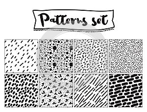 Set of hand drawn backgrounds. Black and white colors. Seamless patterns.