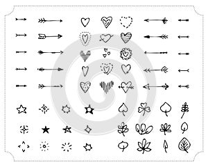 Set of hand-drawn black handle elements. Decorative design elements. Arrows, hearts, stars, lights, leaves. Vector.