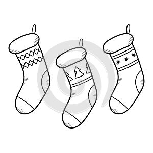Set of hand-drawn Christmas socks. Stockings for gifts. Isolated vector illustrations in doodle style.