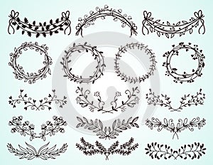 Set of hand-drawn floral borders and wreaths