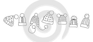 Set with hand drawn hats with pompons. Vector illustration in doodle style. Isolate on a white background