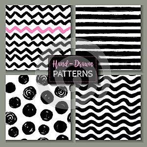 Set of hand drawn ink seamless patterns. Endless vector backgrounds of simple primitive scratchy textures with dots