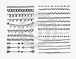 Set of hand drawn lines and dividers. Vector doodle design elements.