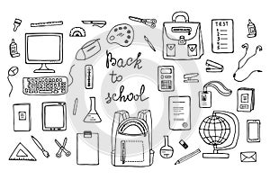 Set hand drawn school items on a sheet with lettering Back to School.