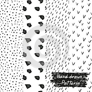 Set of hand drawn seamless patterns in black and white.