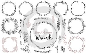 Set of hand drawn wreath and branches. Decorative elements for your design.