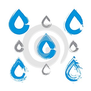 Set of hand-painted blue water drop icons isolated on white back