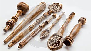 A set of handcarved wooden tools used in Ayurvedic marma therapy designed to stimulate specific energy points on the