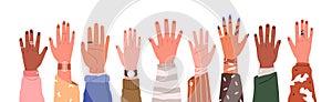 Set of hands raised up. Group of diverse human arms with accessories rising together. Concept of international volunteer