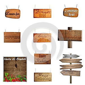 Set of hanging wooden signs on metal chains