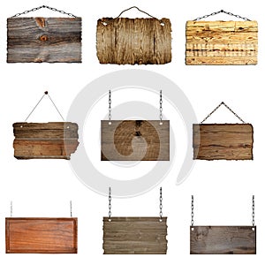 Set of hanging wooden signs on metal chains