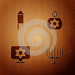 Set Hanukkah menorah, Firework rocket, Star of David and Burning candle on wooden background. Vector