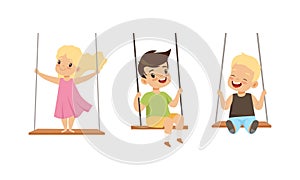 Set of Happy Kids Swinging on Rope Swings, Preschool Children Having Fun Outdoors Cartoon Vector Illustration
