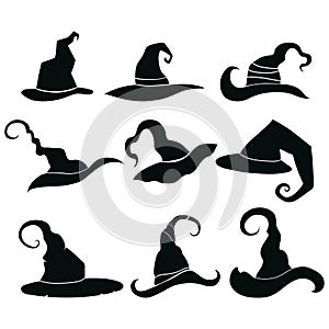 Set of hats of witches. Collection of headdresses of wizards. Silhouettes of hats for a halloween. Illustration for photo