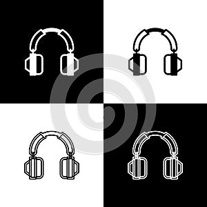Set Headphones icon isolated on black and white background. Earphones. Concept for listening to music, service
