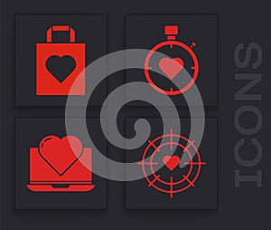 Set Heart in the center of darts target aim, Shopping bag with heart, Heart in the center stopwatch and Laptop with