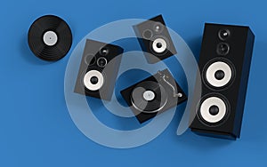 Set of Hi-fi speakers and DJ turntable for sound recording studio on blue.