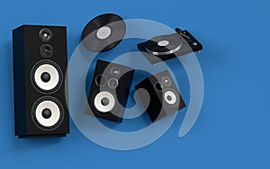 Set of Hi-fi speakers and DJ turntable for sound recording studio on blue.