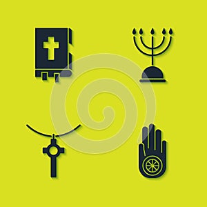 Set Holy bible book, Jainism or Jain Dharma, Christian cross on chain and Hanukkah menorah icon. Vector