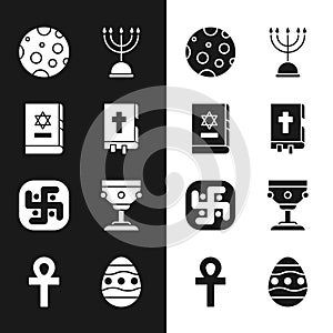 Set Holy bible book, Jewish torah, Moon, Hanukkah menorah, Jainism, Christian chalice, Easter egg and Cross ankh icon