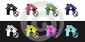 Set House with shield icon isolated on black and white background. Insurance concept. Security, safety, protection