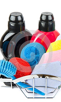 Set of household chemicals items , brushes and rags for cleaning isolated on white . Vertical photo