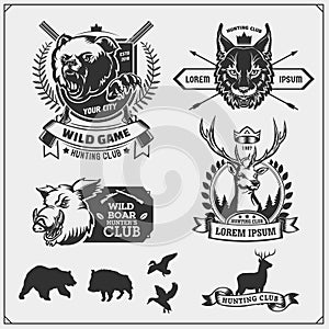 Set of hunting club emblems and design elements.  Bobcat, bear, wild boar, ducks and deer.