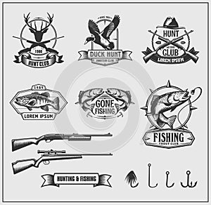 Set of hunting and fishing club badges, labels and design elements.