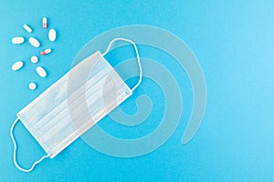 A set of hygienic antiseptics and medications on a blue background