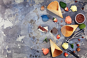 Set of ice cream scoops of different colors and flavours with berries and fruits